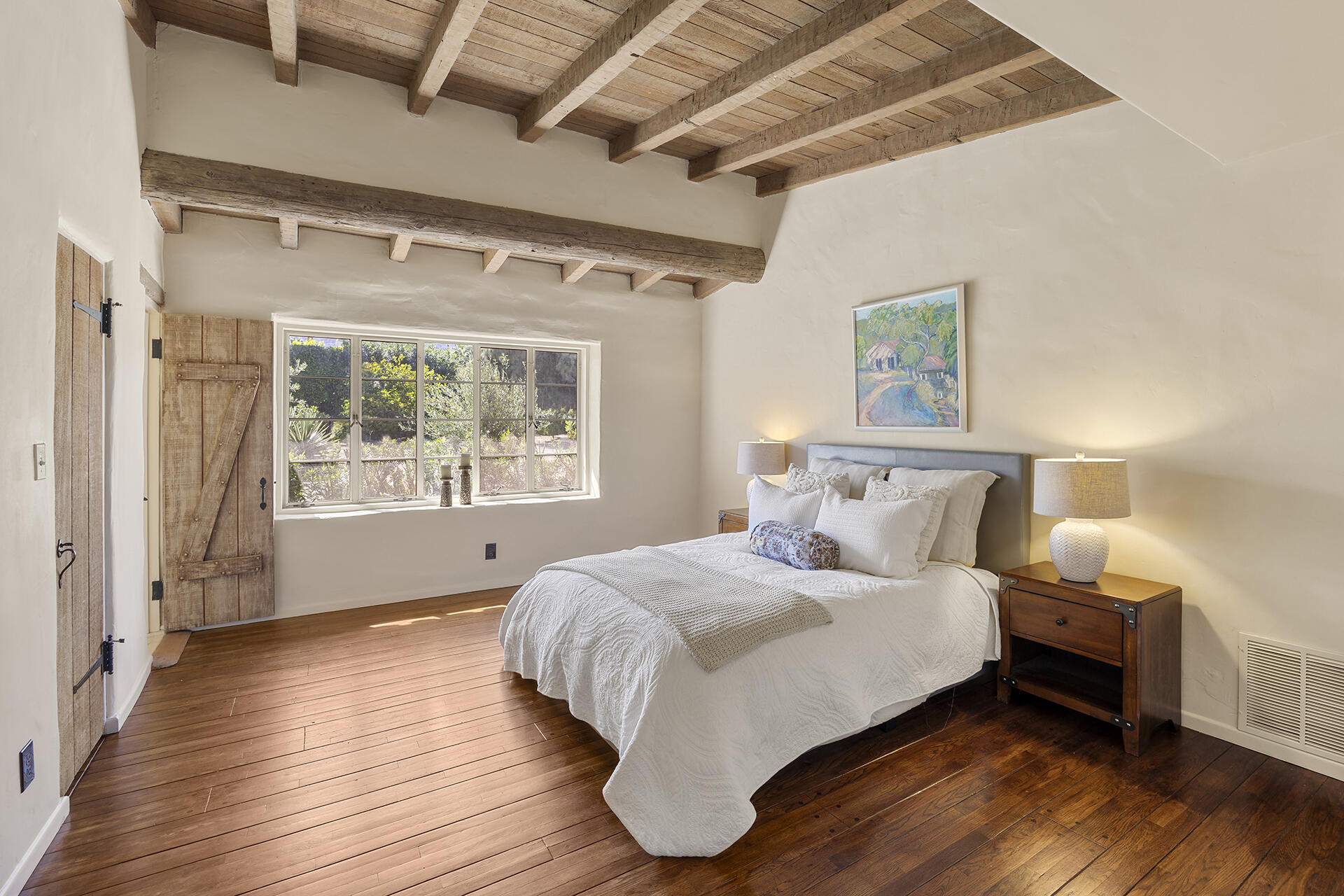 71845 Sahara Road Rancho Mirage, CA 92270 - Photo 14 of 27 a large bed sitting in a bedroom next to a window
