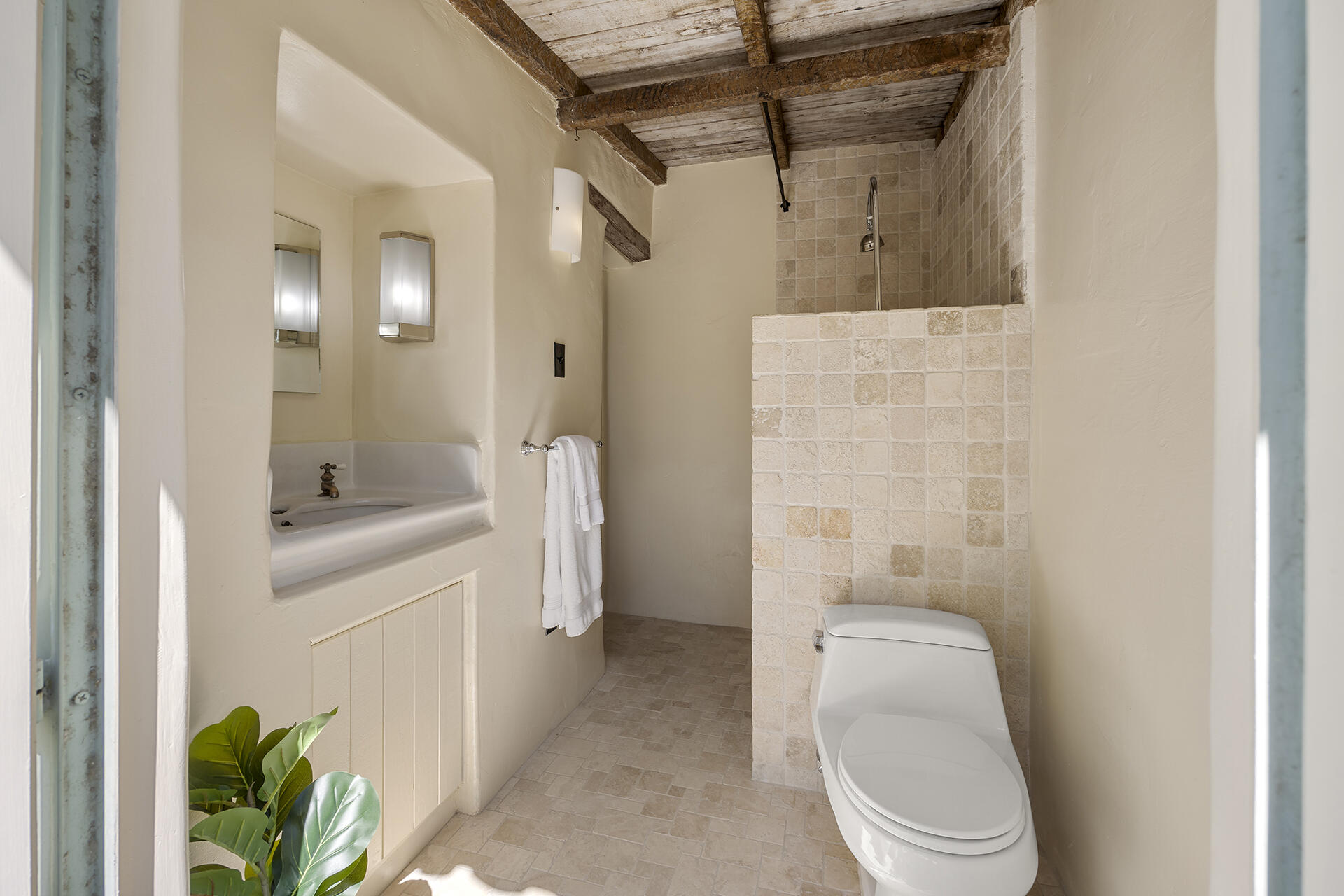 71845 Sahara Road Rancho Mirage, CA 92270 - Photo 15 of 27 a bathroom with a sink a toilet and shower