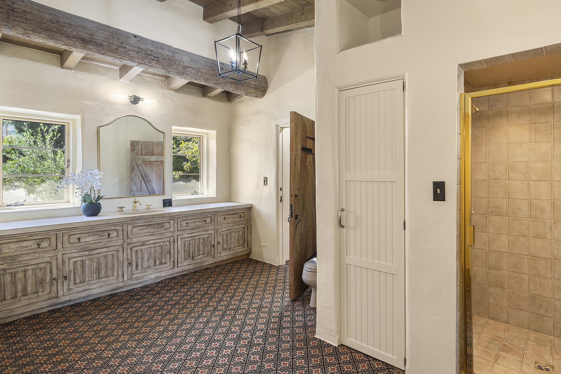 71845 Sahara Road Rancho Mirage, CA 92270 - Photo 18 of 27 a bathroom with a double vanity sink mirror and shower