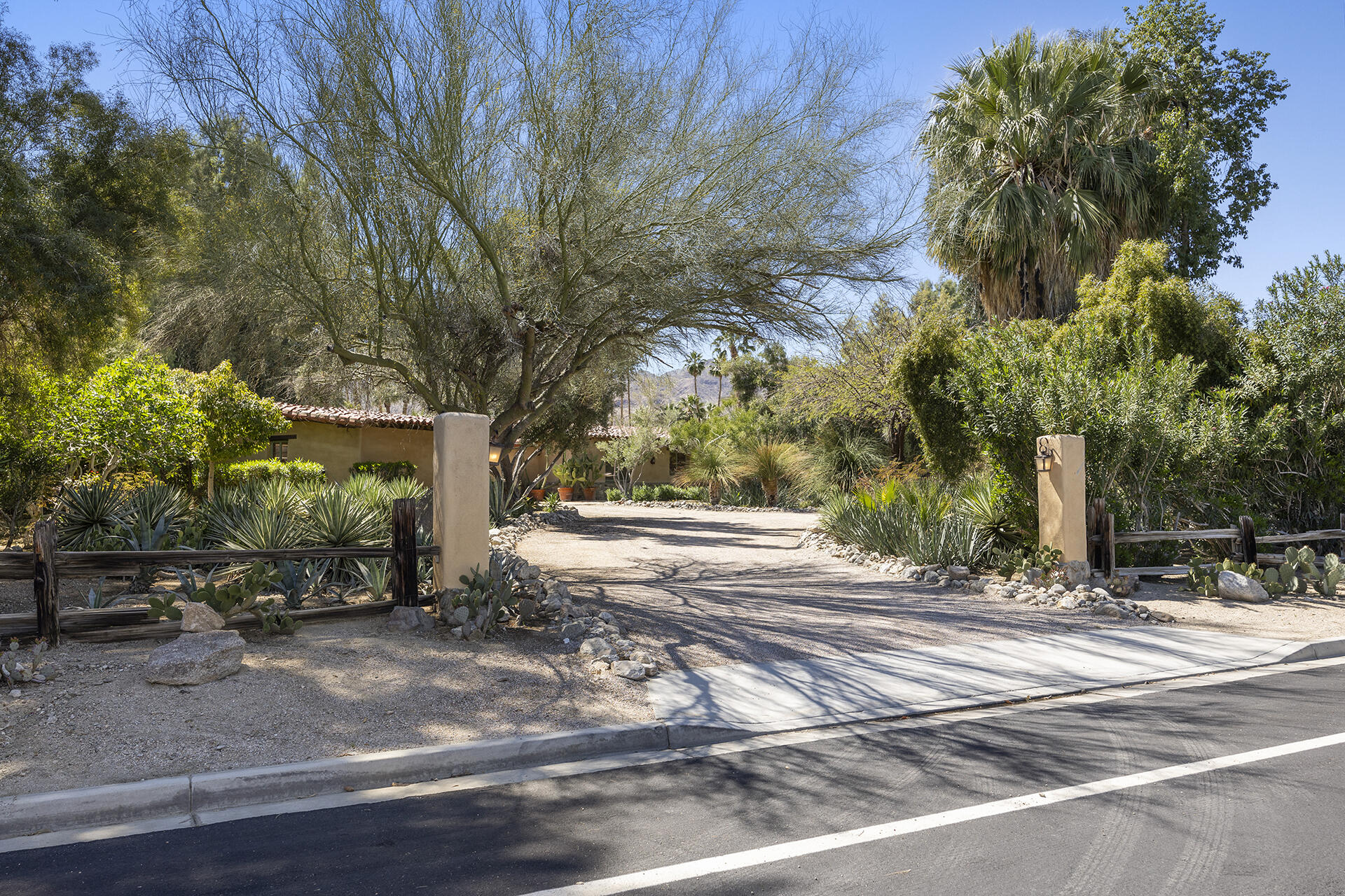 71845 Sahara Road Rancho Mirage, CA 92270 - Photo 2 of 27 a view of street with houses