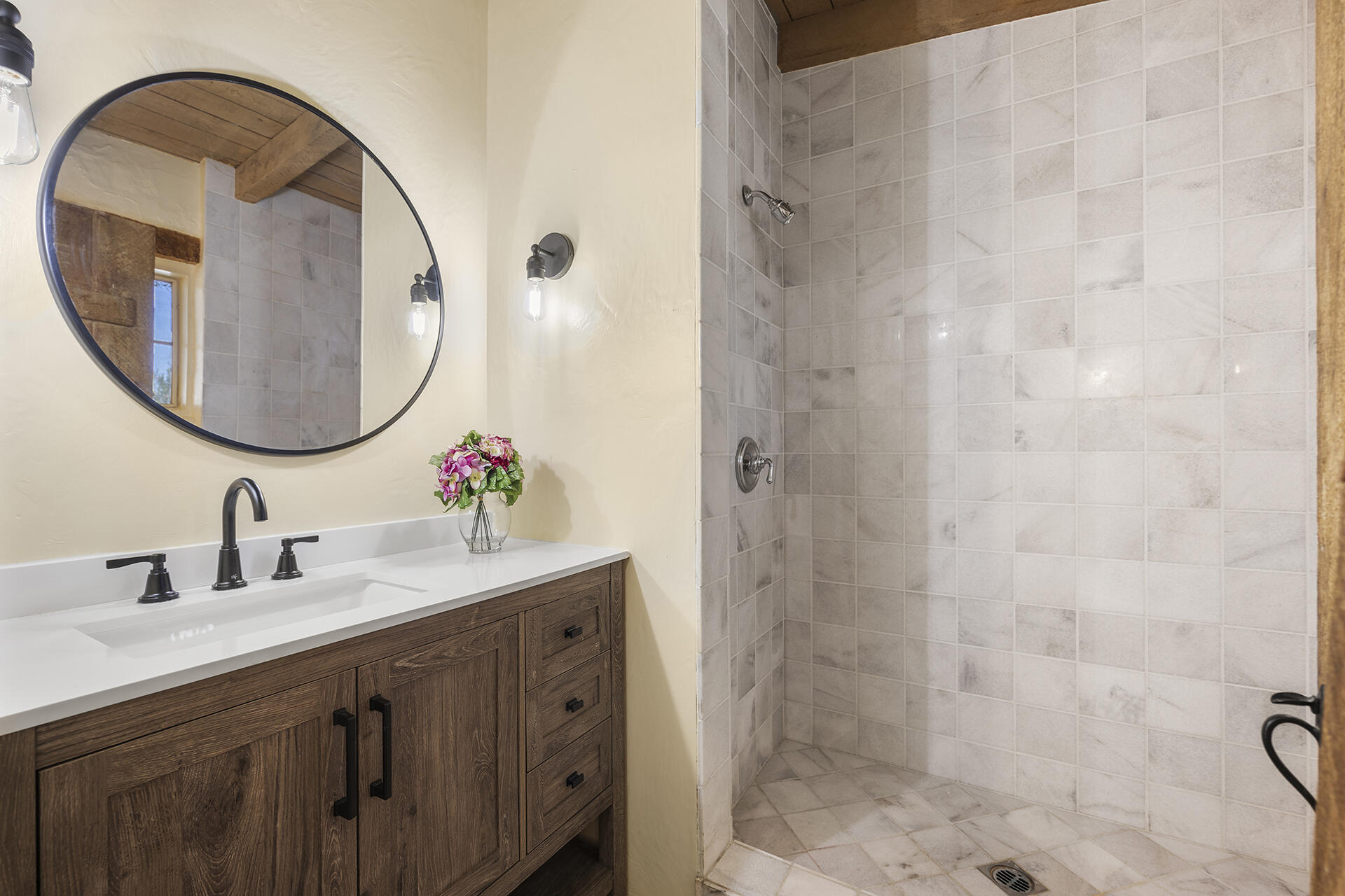71845 Sahara Road Rancho Mirage, CA 92270 - Photo 21 of 27 a bathroom with a double vanity sink and a mirror