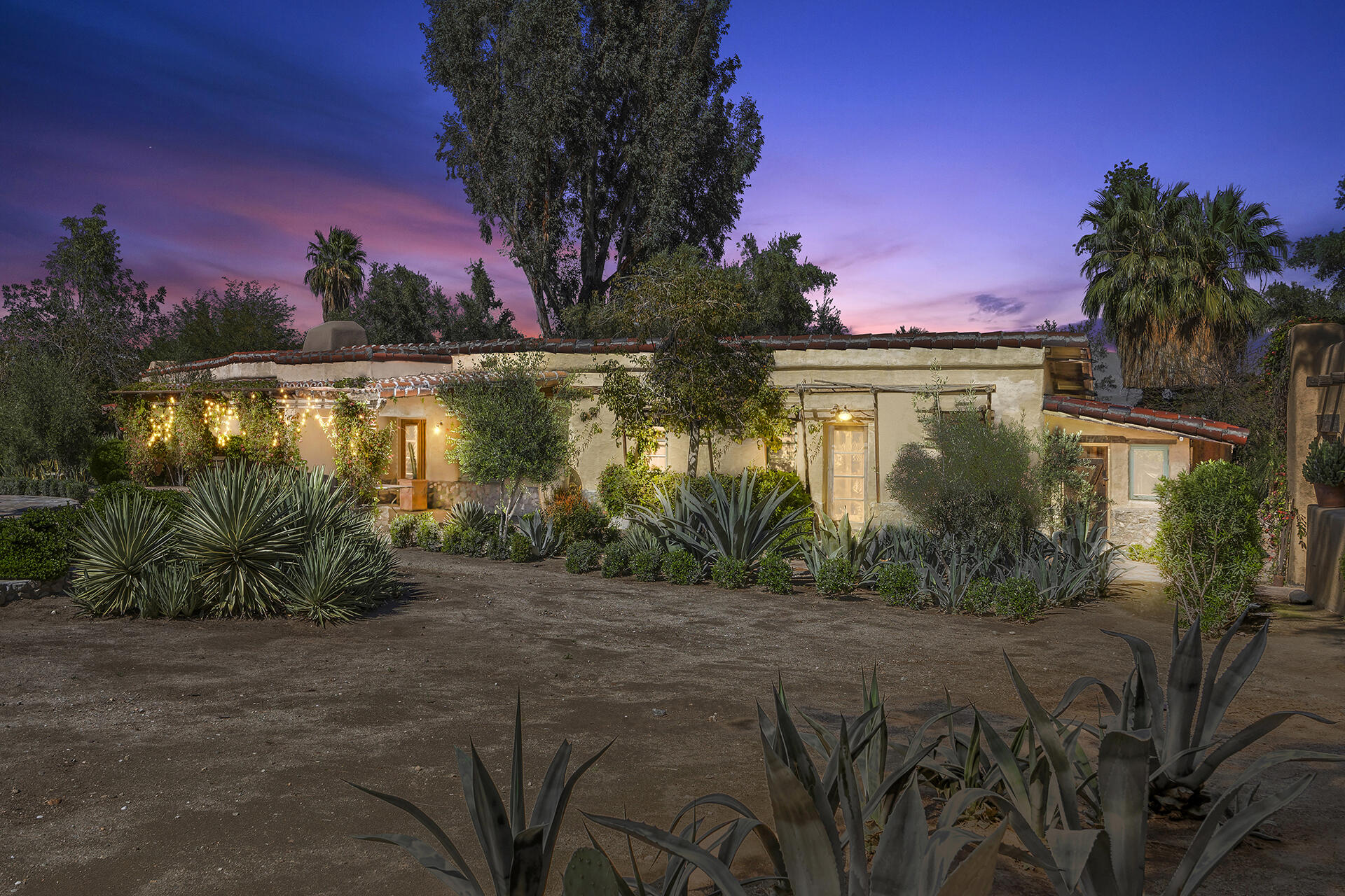 71845 Sahara Road Rancho Mirage, CA 92270 - Photo 25 of 27 a front view of a house with a yard