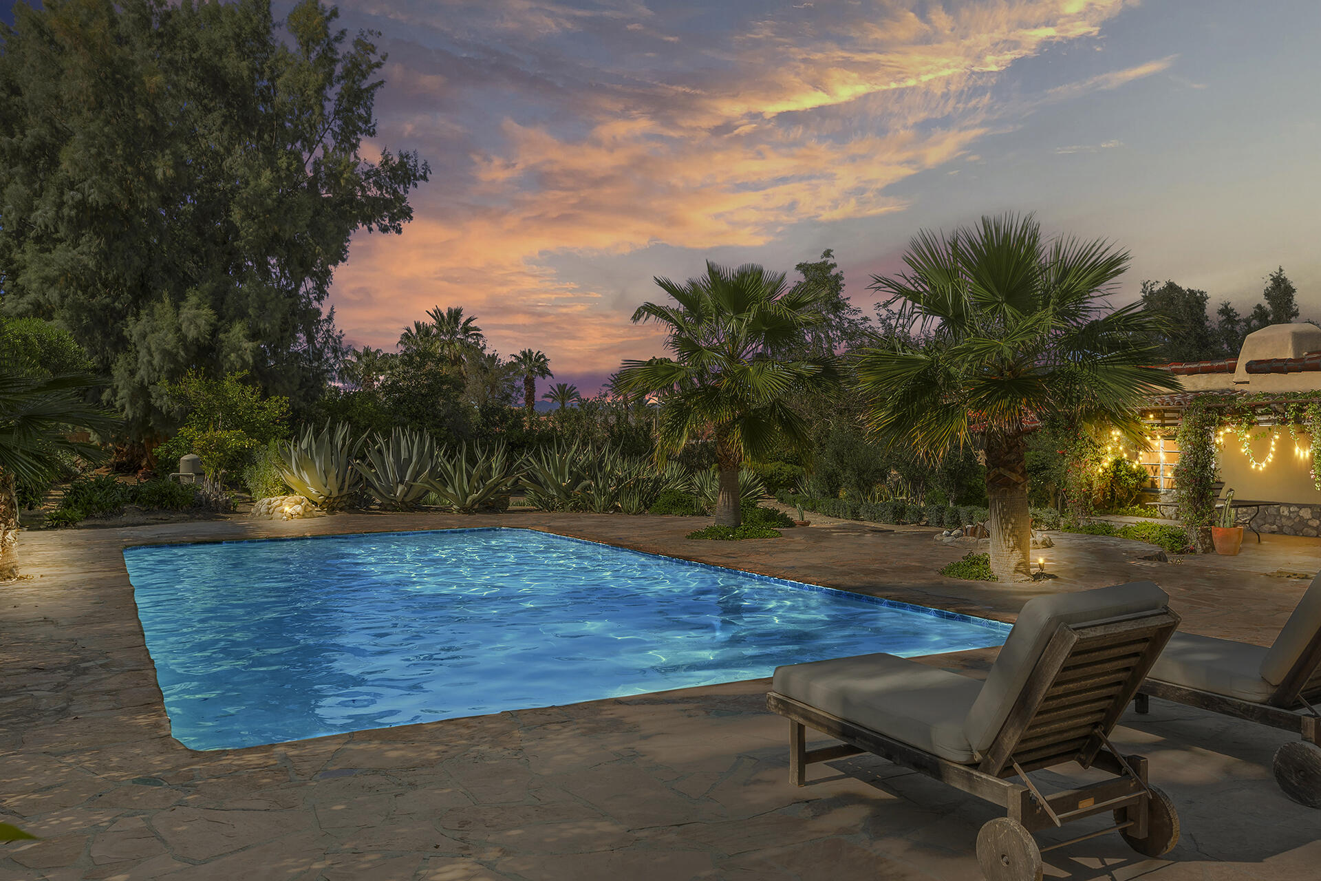 71845 Sahara Road Rancho Mirage, CA 92270 - Photo 26 of 27 a view of a swimming pool with a yard
