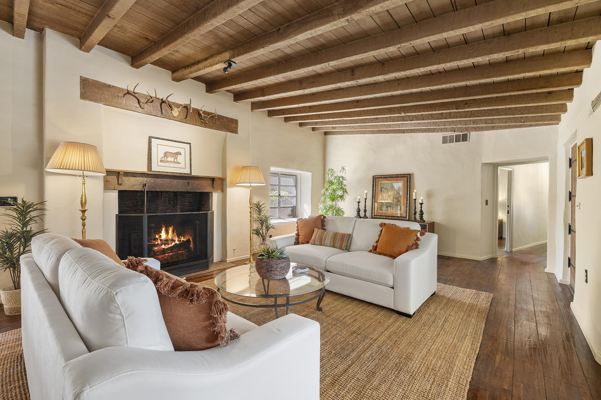 71845 Sahara Road Rancho Mirage, CA 92270 - Photo 6 of 27 a living room with furniture and a fireplace