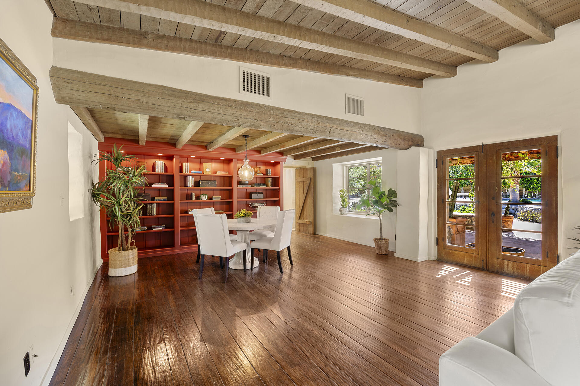 71845 Sahara Road Rancho Mirage, CA 92270 - Photo 7 of 27 a view of a dining room with furniture and wooden floor