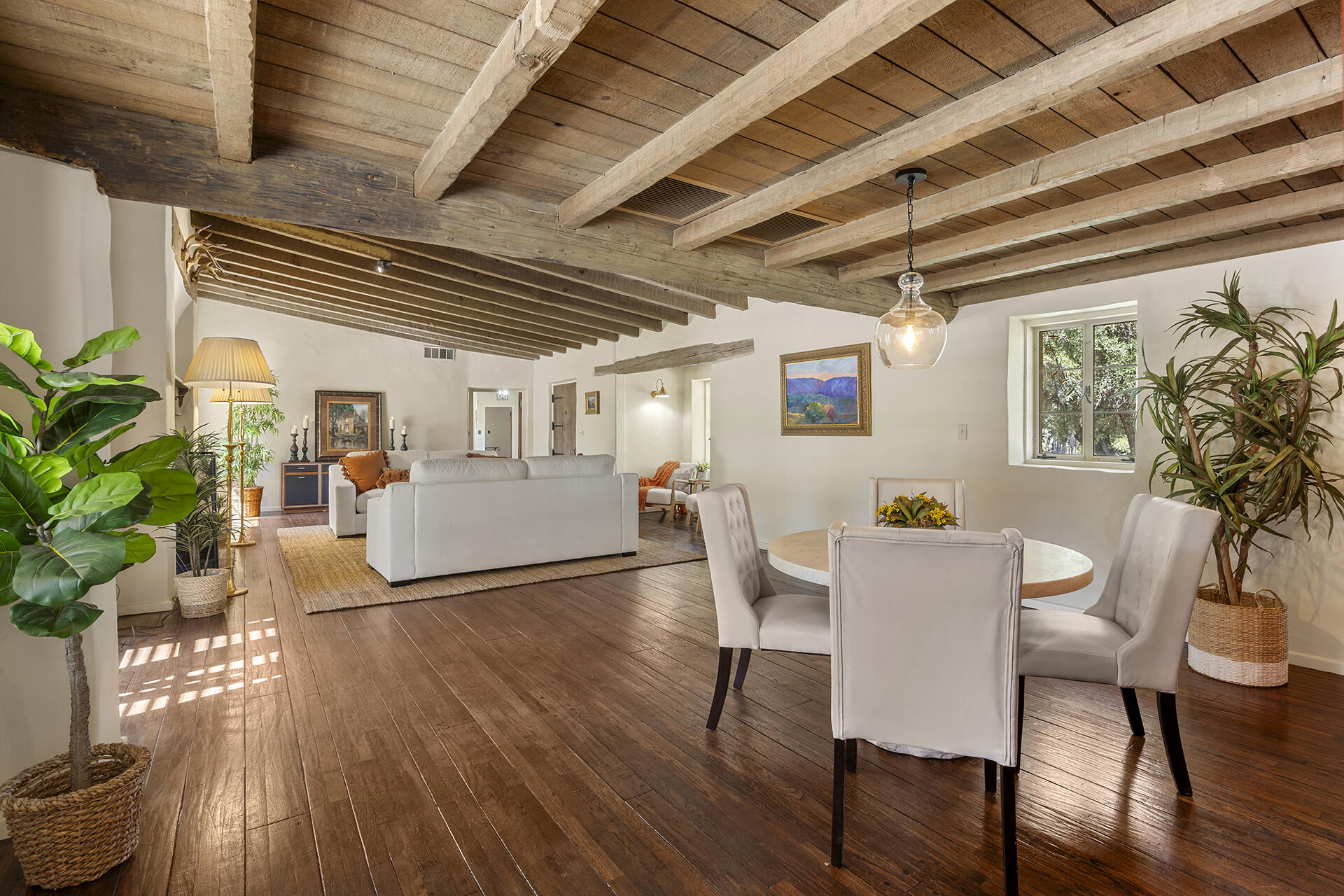 71845 Sahara Road Rancho Mirage, CA 92270 - Photo 9 of 27 a view of a dining room with furniture window and wooden floor