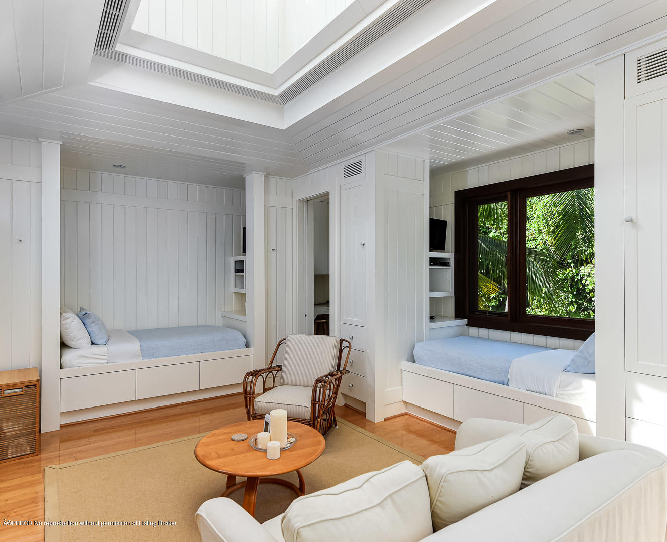 309 Garden Road Palm Beach, FL 33480 - Photo 12 of 26 a living room with furniture and a large window