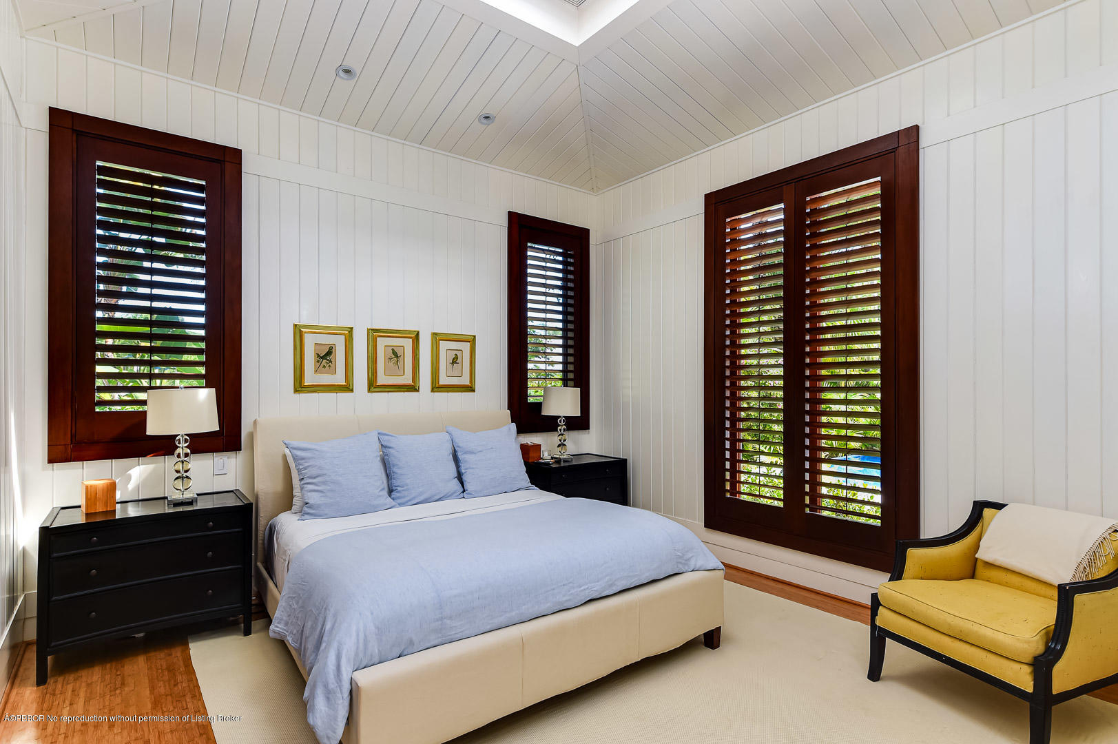 309 Garden Road Palm Beach, FL 33480 - Photo 16 of 26 a bedroom with a bed and windows