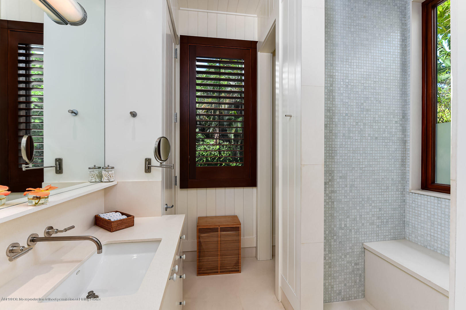 309 Garden Road Palm Beach, FL 33480 - Photo 17 of 26 a bathroom with a sink a toilet and a mirror