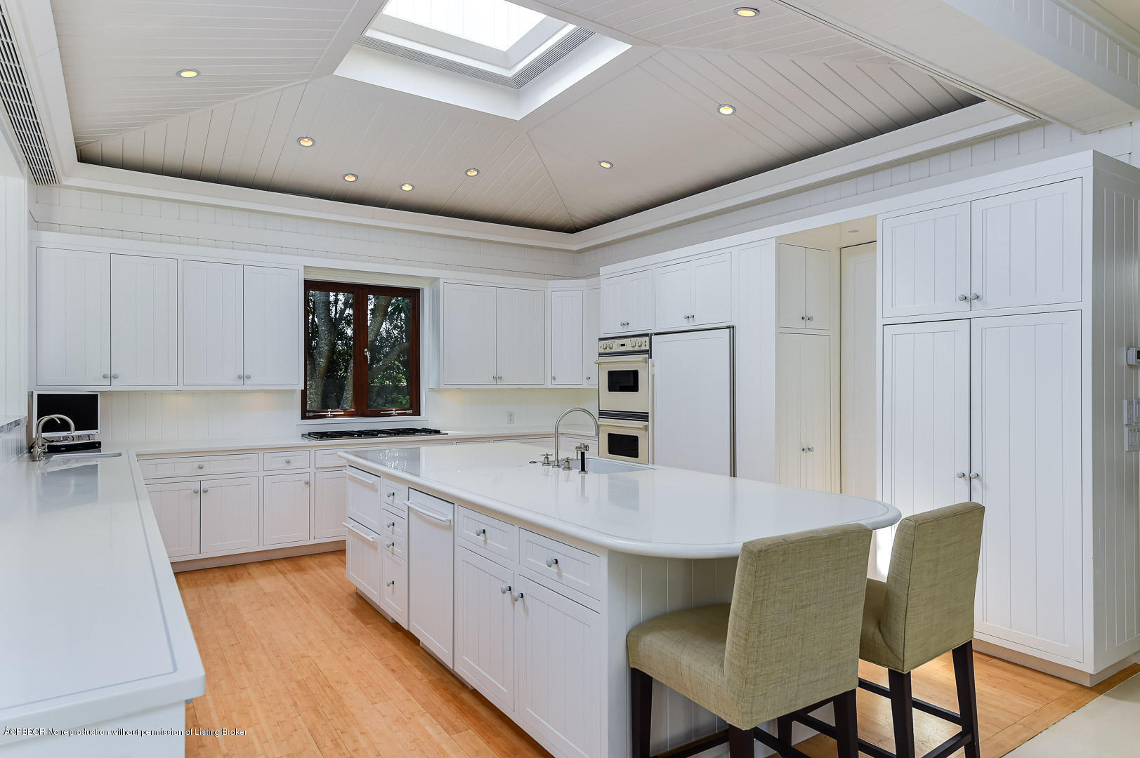 309 Garden Road Palm Beach, FL 33480 - Photo 7 of 26 a kitchen with a sink cabinets and window