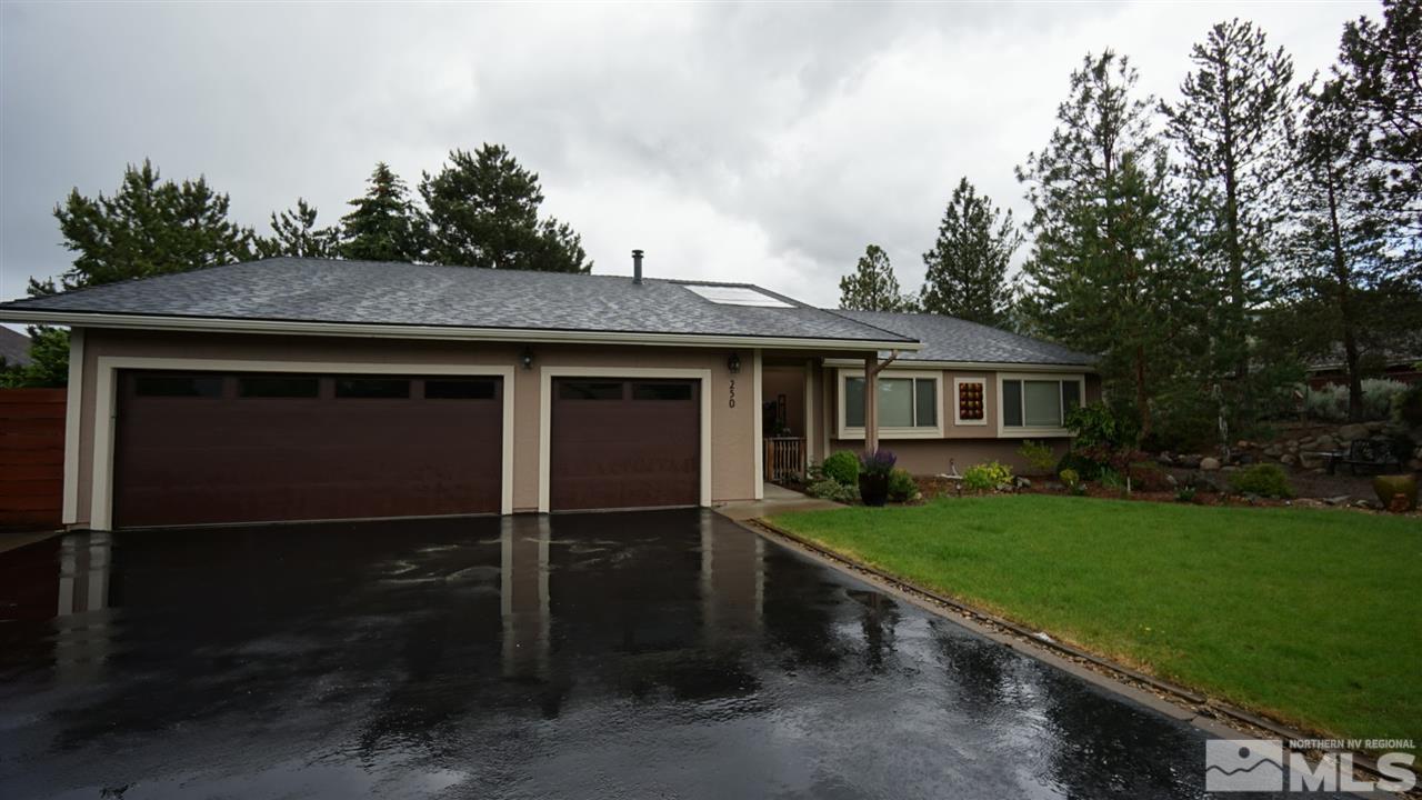 250 Mountain Ridge Road Reno, NV 89523 - Photo 1 of 1 a front view of a house with garden