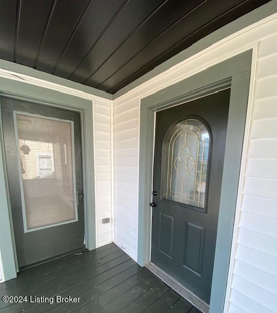 2939 Waddy Road Waddy, KY 40076 - Photo 7 of 54 Front door to home and door to Bedroom