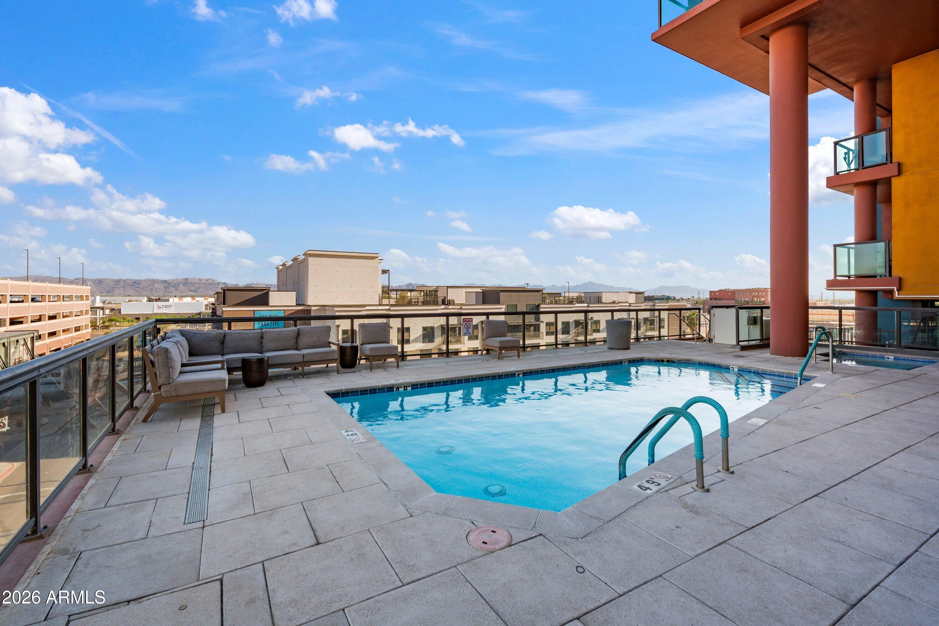 310 South 4th Street, Unit 601 Phoenix, AZ 85004 - Photo 25 of 29 a view of a balcony with furniture