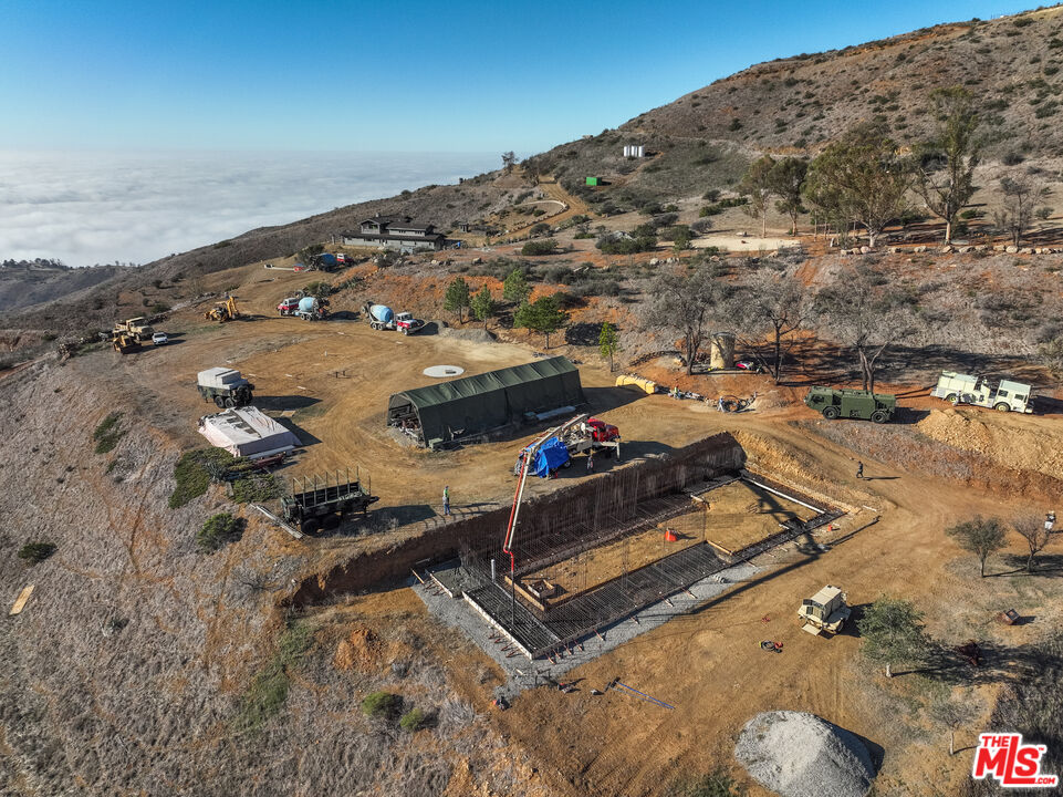 9950 Cotharin Road Malibu, CA 90265 - Photo 8 of 48 an aerial view of residential houses with outdoor space