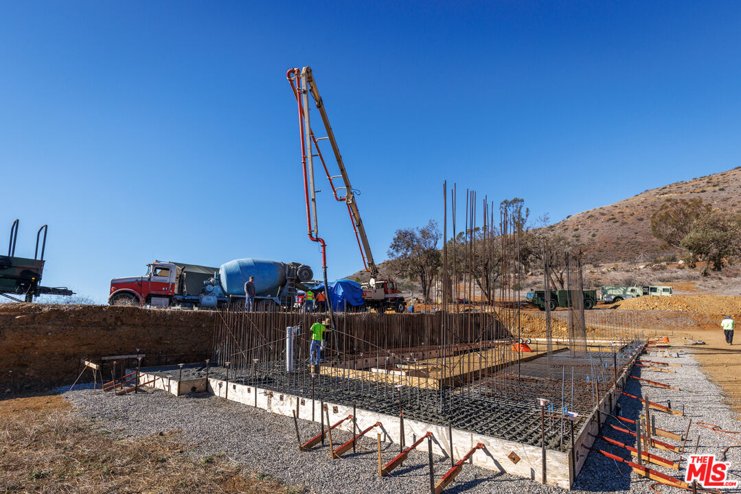 9950 Cotharin Road Malibu, CA 90265 - Photo 10 of 48 a view of a balcony with chairs