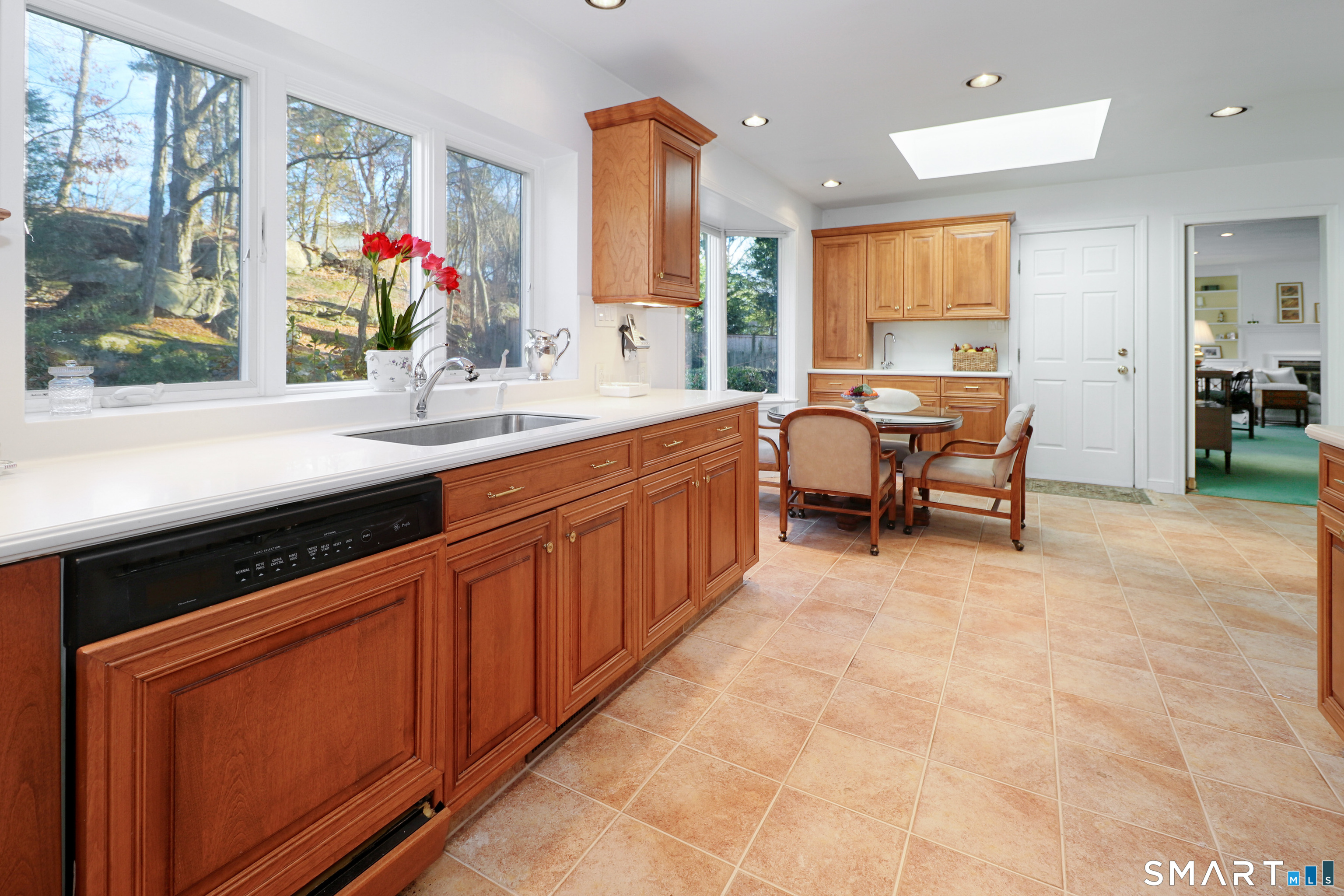 5 Over Rock Lane Westport, CT 06880 - Photo 12 of 28 Kitchen view into great room and access to rear patio, laundry and basement.