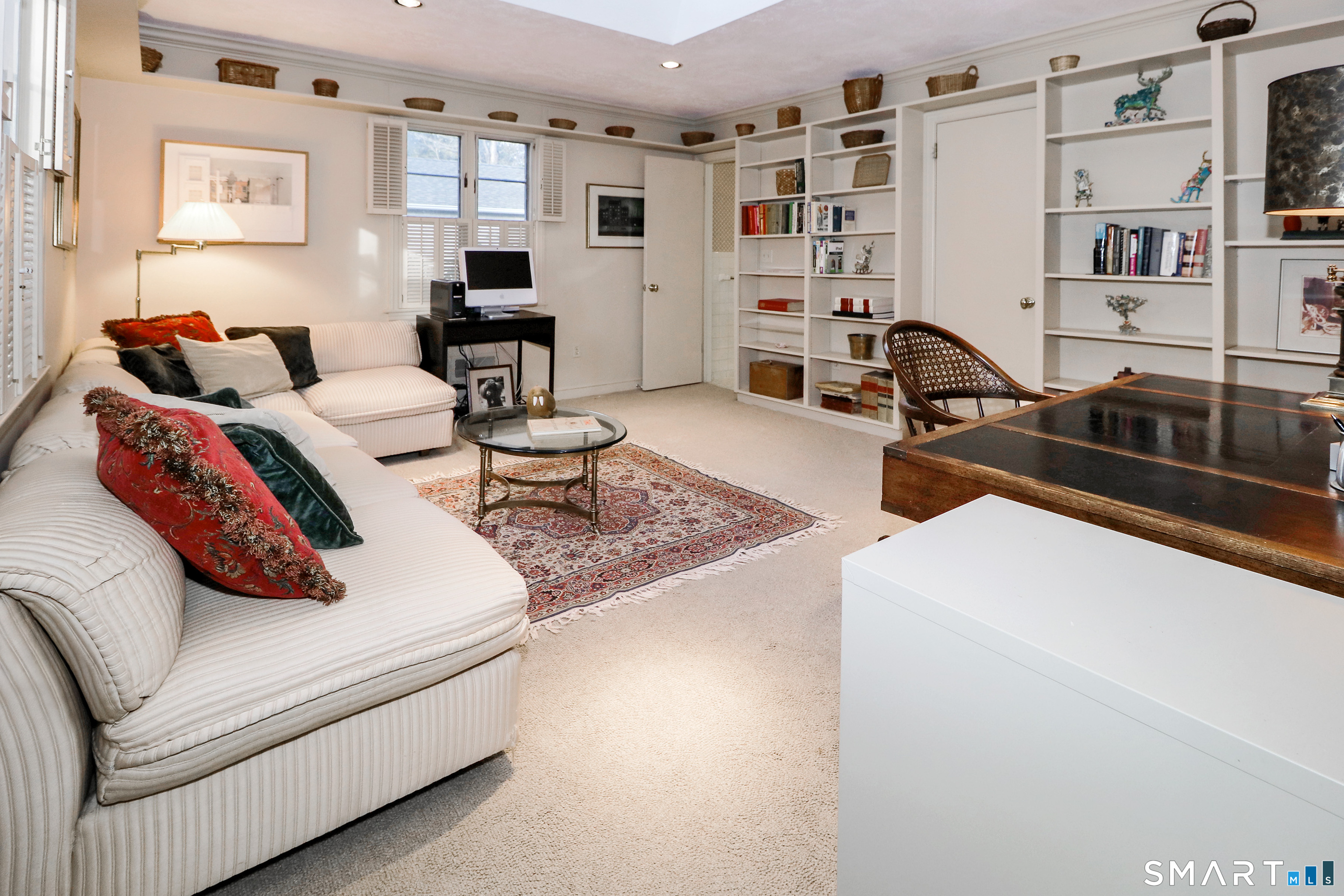 5 Over Rock Lane Westport, CT 06880 - Photo 21 of 28 Third bedroom suite is located off the foyer and has been configured as a library with a wall of bookshelves.