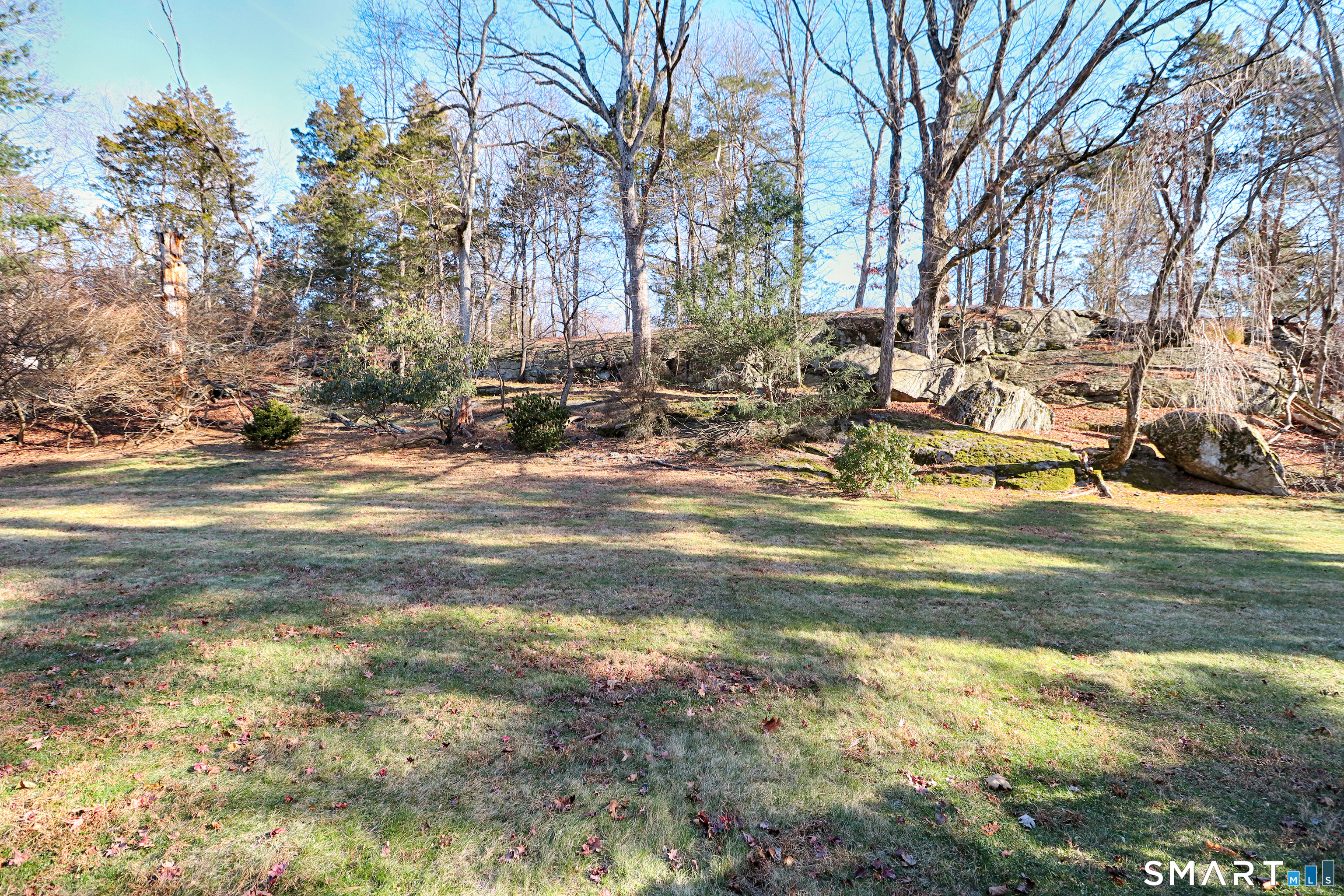 5 Over Rock Lane Westport, CT 06880 - Photo 25 of 28 Natural rock outcropping provides backyard privacy.