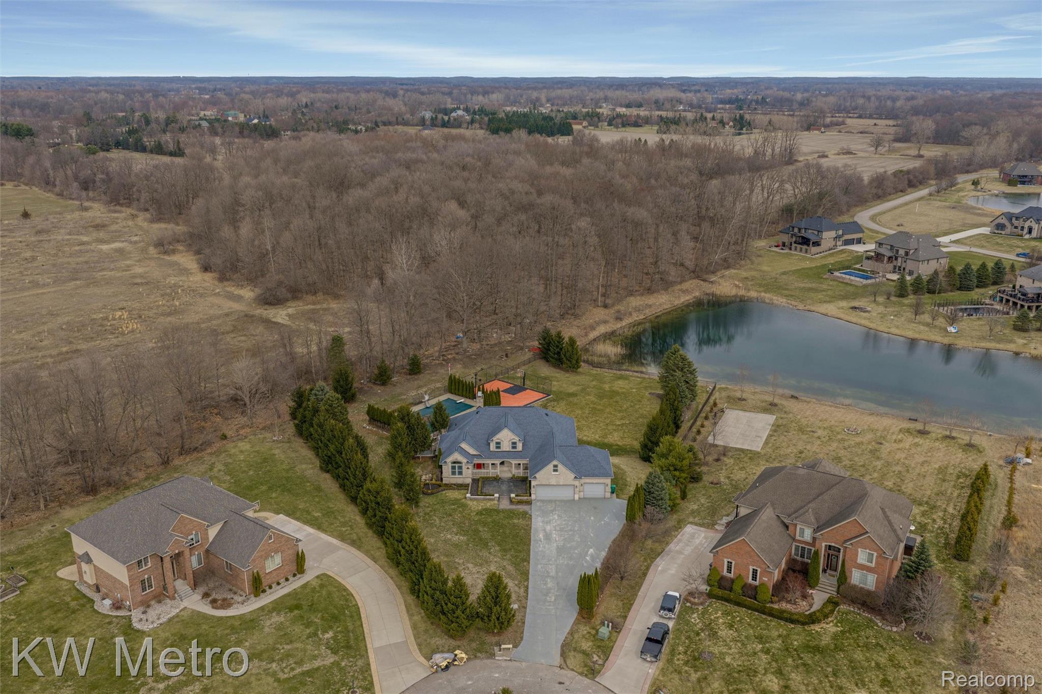 65884 Windrose Court Ray, MI 48096 - Photo 82 of 82 Aerial view of property and surrounding area with a nearby body of water