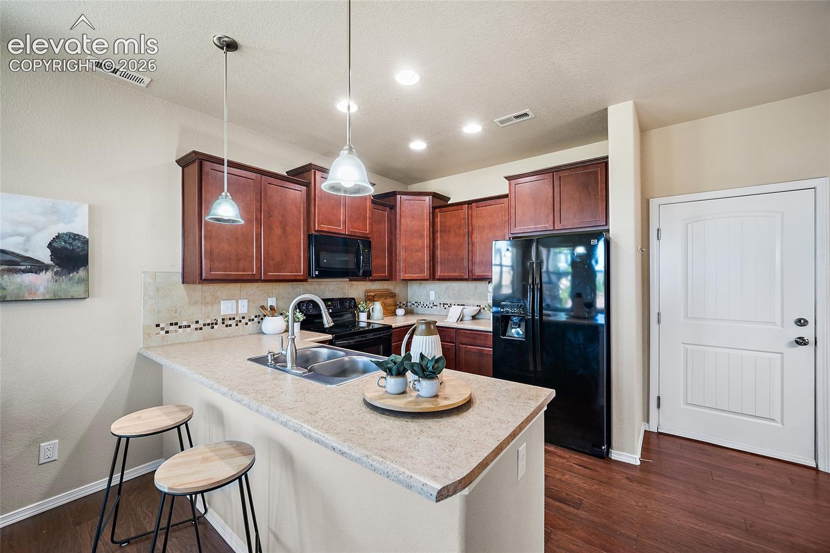 5348 Prominence Point Colorado Springs, CO 80923 - Photo 5 of 29 Open Kitchen