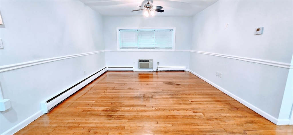 7 Oakcrest Road, Unit 6 Boston, MA 02136 - Photo 8 of 10 a view of an empty room with a window