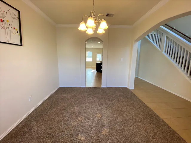 a view of a livingroom with a chandelier