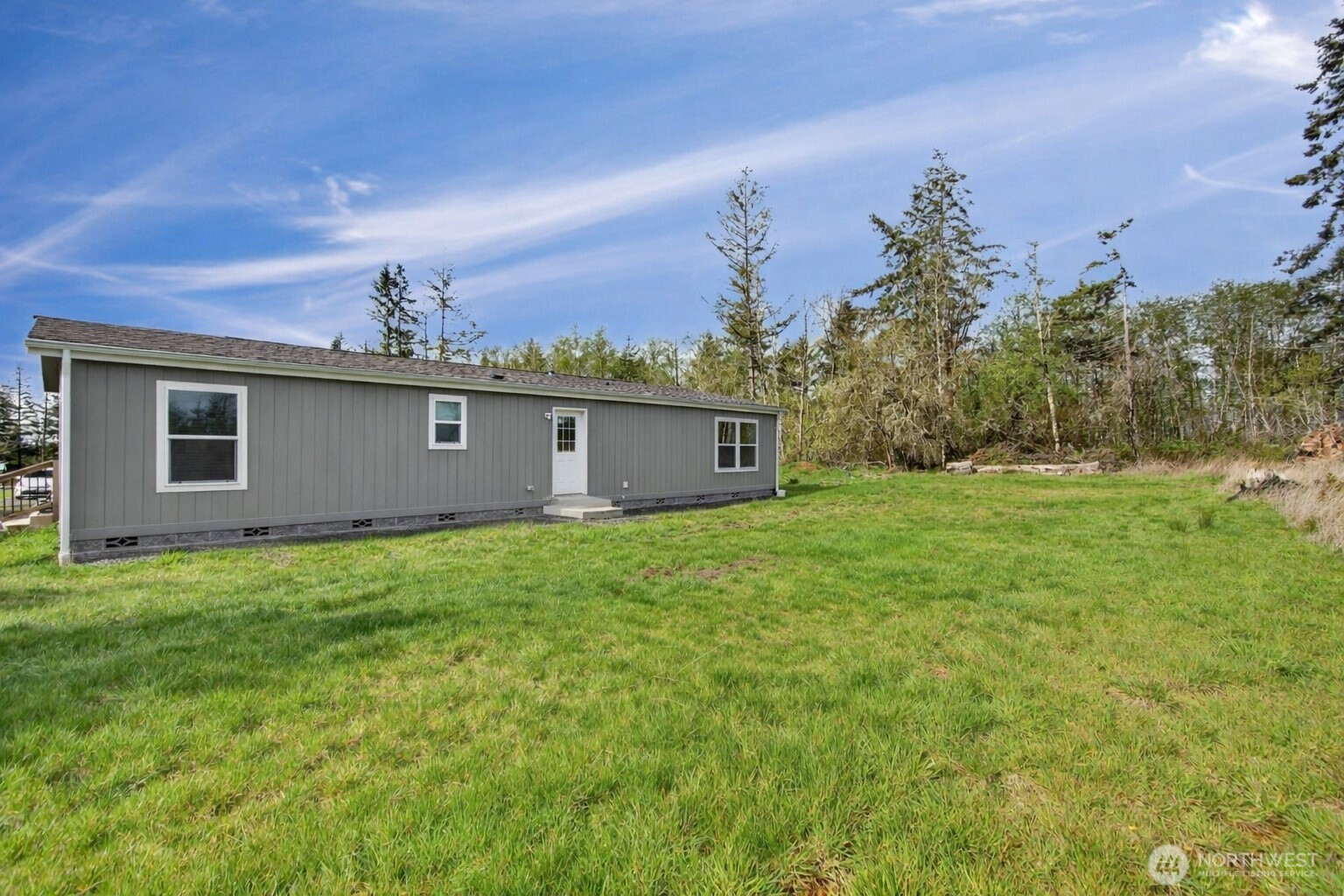 1369 Centralia Alpha Road Chehalis, WA 98532 - Photo 2 of 18 a view of a backyard with a garden
