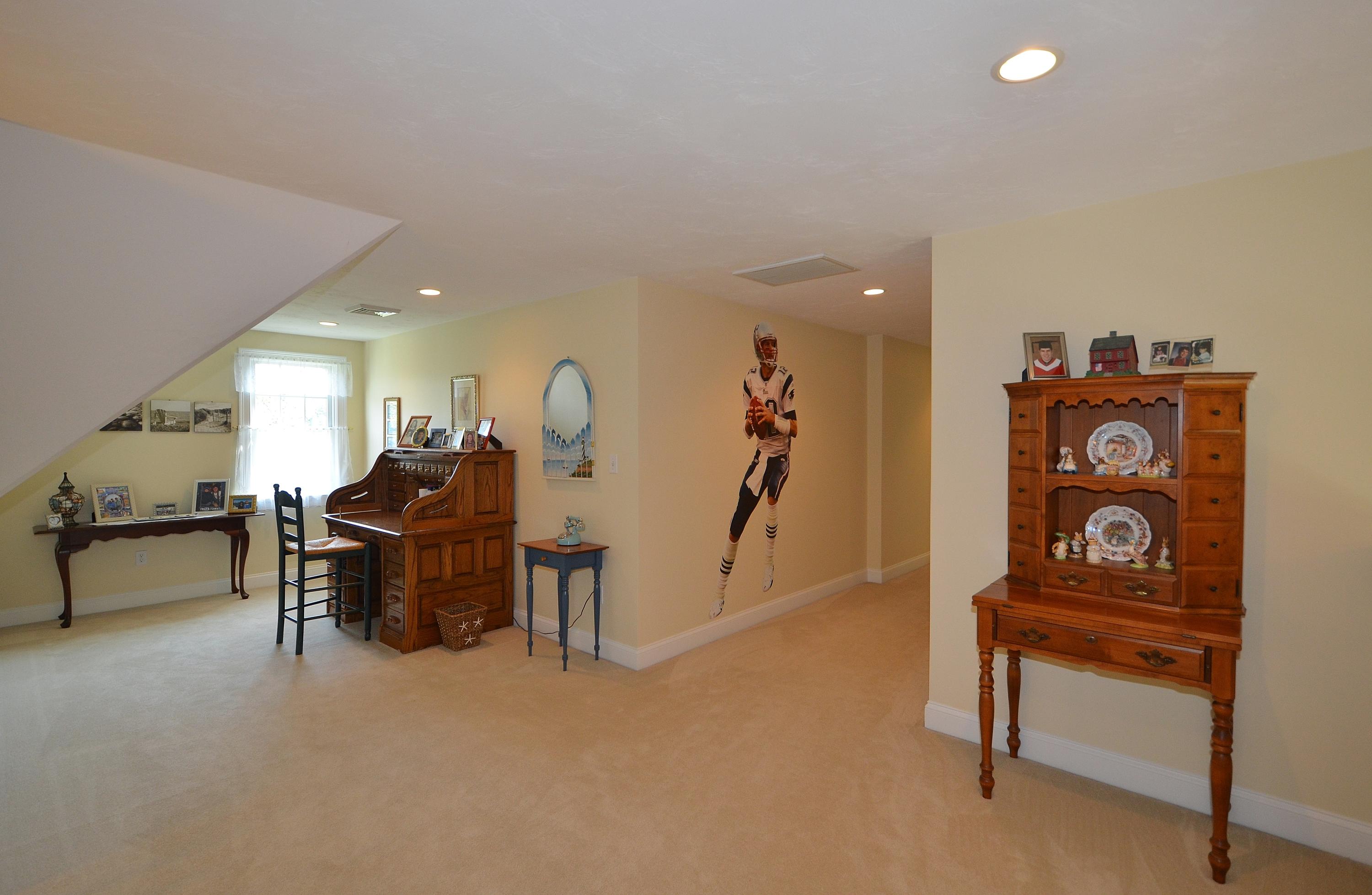 121 Cairn Ridge Road East Falmouth, MA 02536 - Photo 15 of 28 a living room with furniture and a table
