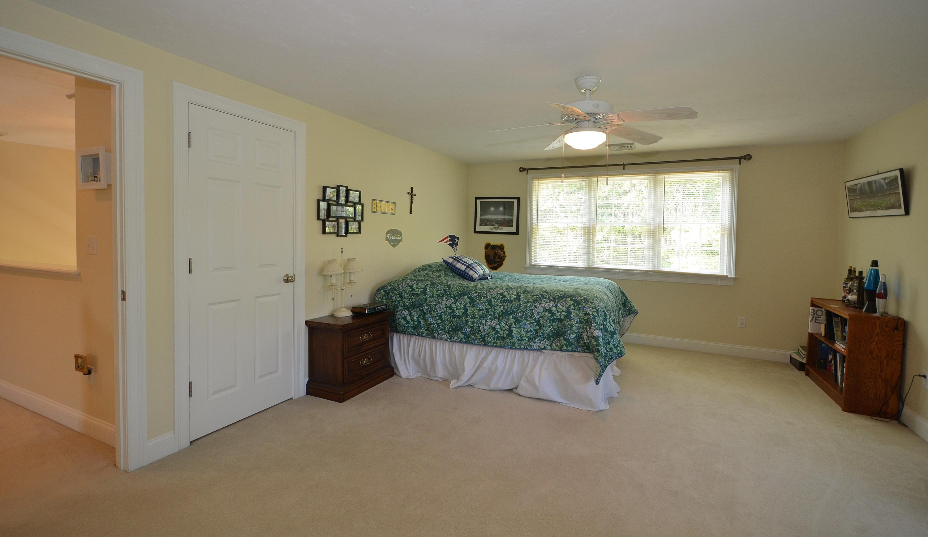 121 Cairn Ridge Road East Falmouth, MA 02536 - Photo 17 of 28 a living room with furniture and windows
