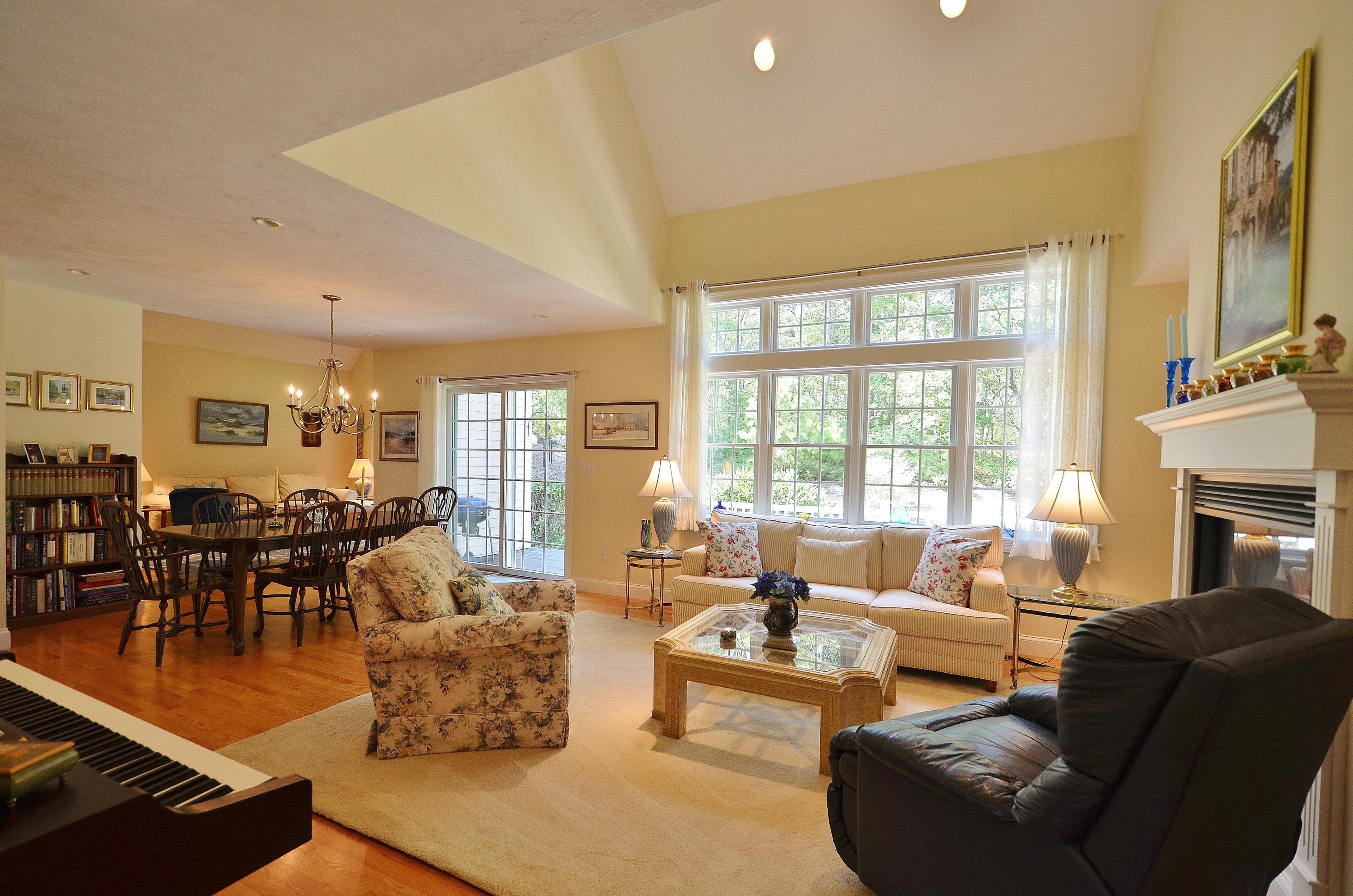 121 Cairn Ridge Road East Falmouth, MA 02536 - Photo 4 of 28 a living room with furniture fireplace and flat screen tv