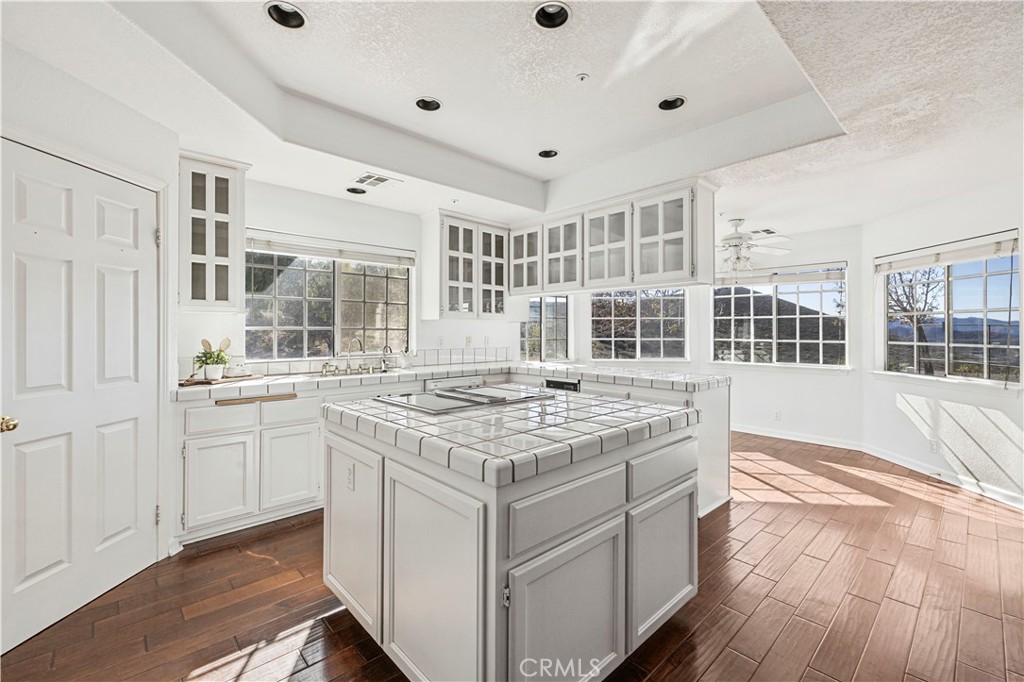 4131 Pelona Canyon Road Acton, CA 93510 - Photo 12 of 58 a kitchen with a stove and cabinets