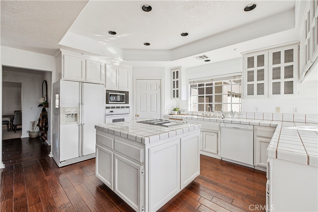 4131 Pelona Canyon Road Acton, CA 93510 - Photo 13 of 58 a kitchen with stainless steel appliances granite countertop a stove and a refrigerator