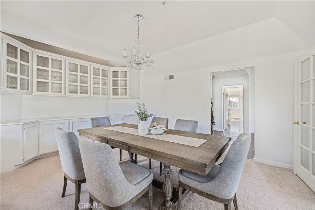 4131 Pelona Canyon Road Acton, CA 93510 - Photo 18 of 58 a view of a dining room with furniture window and wooden floor