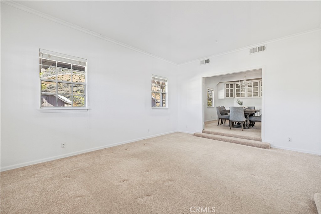 4131 Pelona Canyon Road Acton, CA 93510 - Photo 20 of 58 a view of a livingroom with workspace and a window