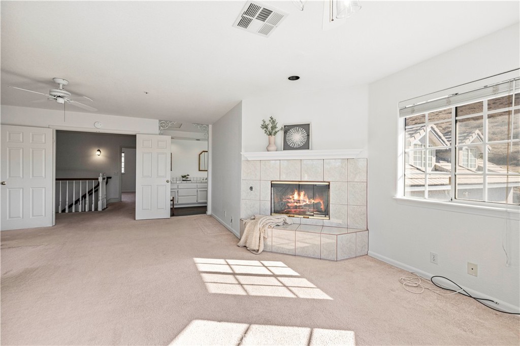 4131 Pelona Canyon Road Acton, CA 93510 - Photo 27 of 58 a living room with furniture and a fireplace