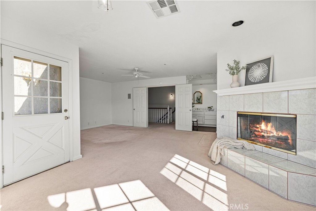 4131 Pelona Canyon Road Acton, CA 93510 - Photo 28 of 58 a living room with furniture and a fireplace