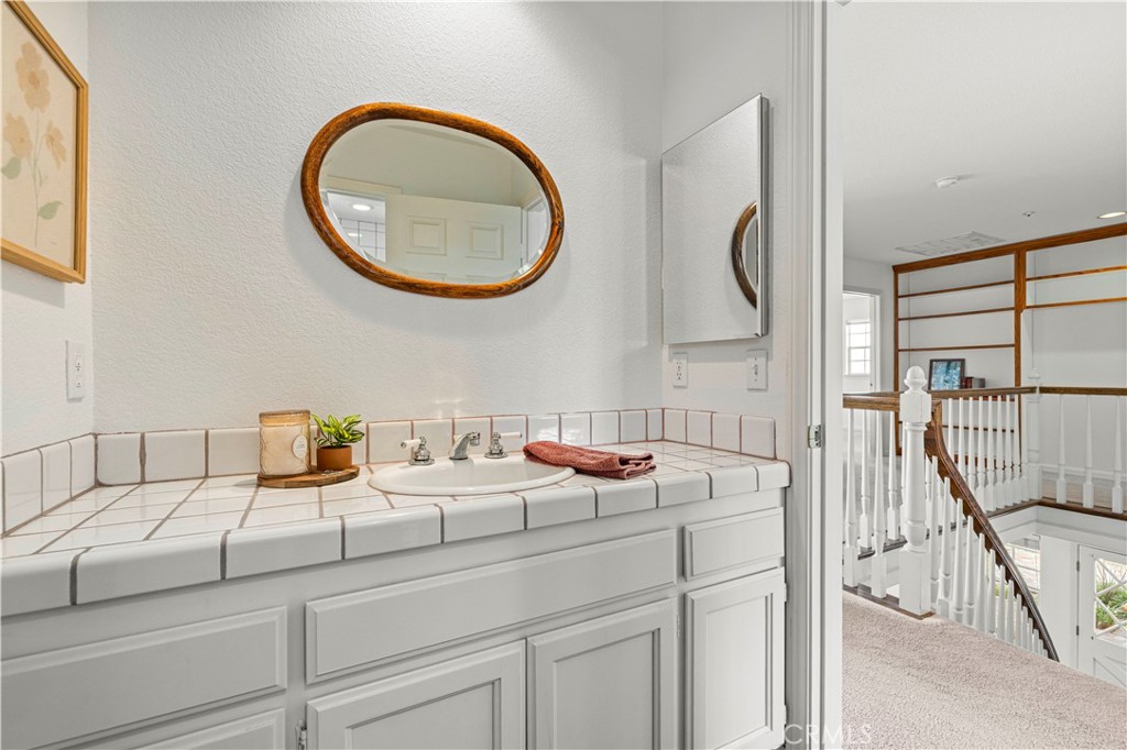 4131 Pelona Canyon Road Acton, CA 93510 - Photo 36 of 58 a bathroom with a sink and a mirror