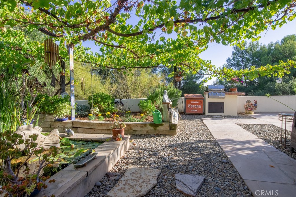 10900 Rimpau Road Fallbrook, CA 92028 - Photo 11 of 14 a backyard of a house with lots of green space