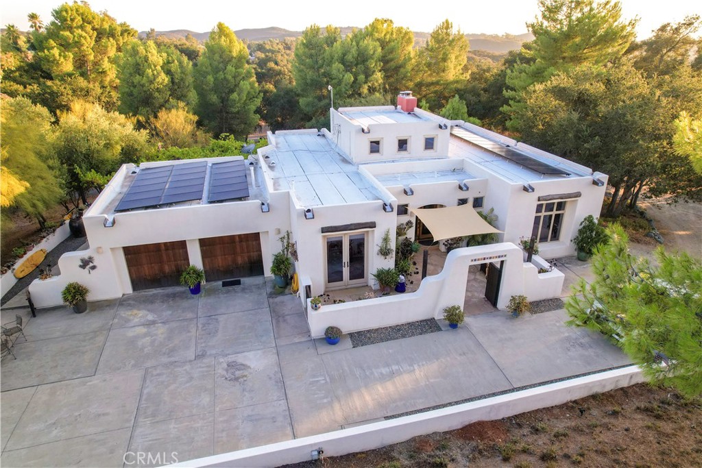 10900 Rimpau Road Fallbrook, CA 92028 - Photo 14 of 14 a aerial view of a house with a yard and garage
