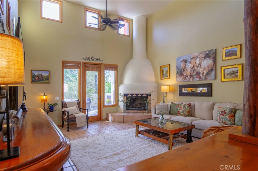 10900 Rimpau Road Fallbrook, CA 92028 - Photo 2 of 14 a living room with furniture and a table
