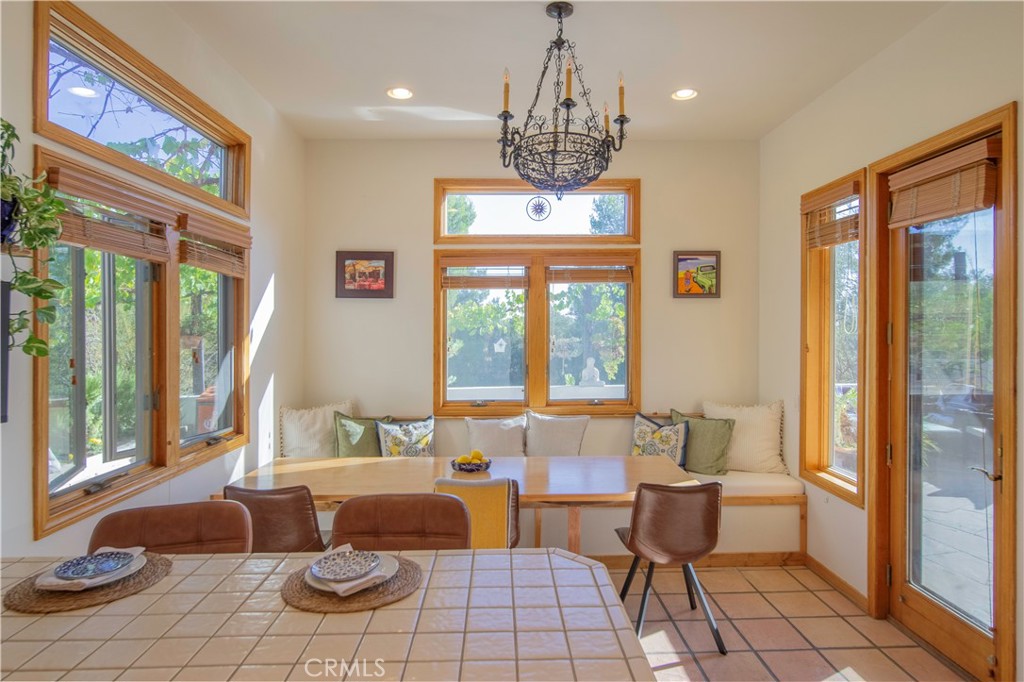 10900 Rimpau Road Fallbrook, CA 92028 - Photo 5 of 14 a living room with furniture and a chandelier