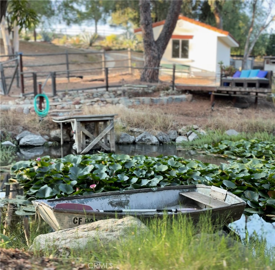 10900 Rimpau Road Fallbrook, CA 92028 - Photo 10 of 14 a view of a backyard with sitting area