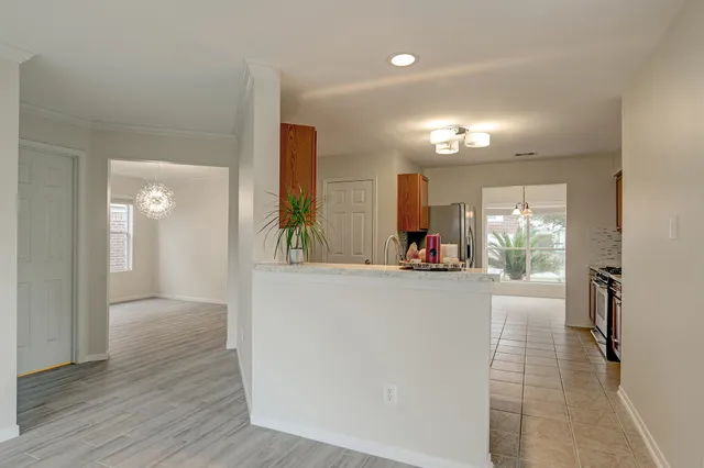 a view of a living room and dining room