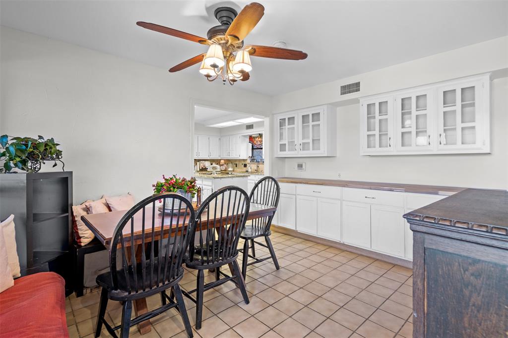404 Laurel Trail North Terrell, TX 75160 - Photo 12 of 29 a dining room with furniture a chandelier and wooden floor