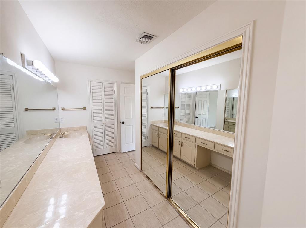 404 Laurel Trail North Terrell, TX 75160 - Photo 16 of 29 a bathroom with a sink and a mirror