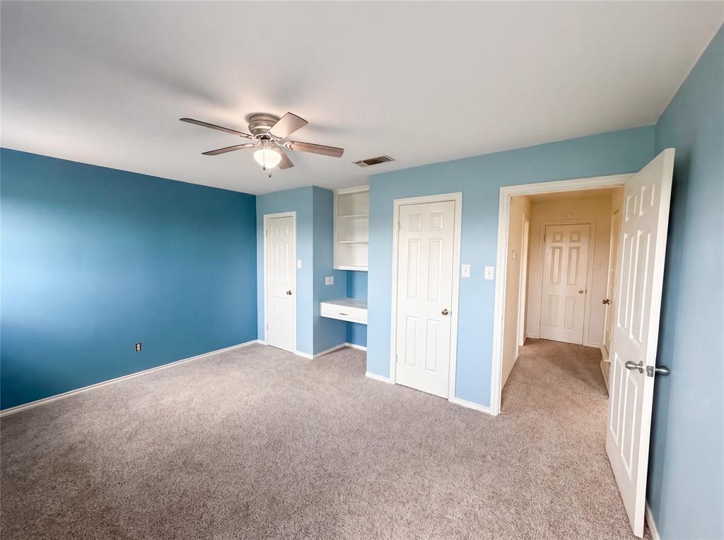 404 Laurel Trail North Terrell, TX 75160 - Photo 21 of 29 a view of a room with a ceiling fan and a kitchen view