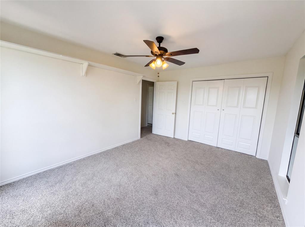 404 Laurel Trail North Terrell, TX 75160 - Photo 22 of 29 a view of an empty room and a ceiling fan