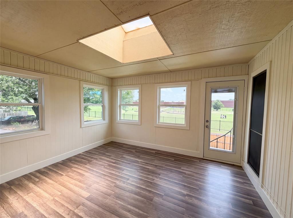 404 Laurel Trail North Terrell, TX 75160 - Photo 24 of 29 a view of an empty room with wooden floor and a window