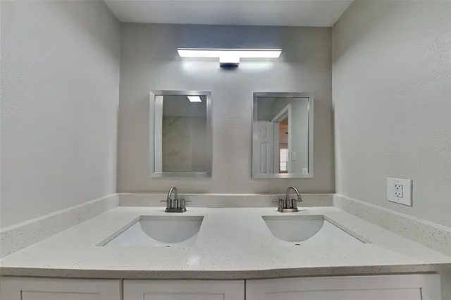 a bathroom with a toilet and a bathtub