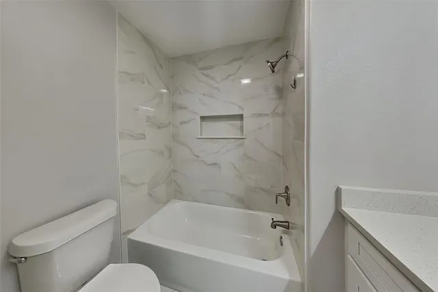 a house with trees in the background